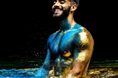 Abstract Male Art Ai Photos of Beautiful Men Enveloped by Vibrant Blue & Gold Colors