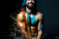 Abstract Male Art Ai Photos of Beautiful Men Enveloped by Vibrant Blue & Gold Colors