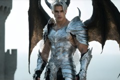 The Dragon Prince - A very attractive shirtless young male prince,standing next to him a huge dragon.