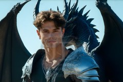 The Dragon Prince - A very attractive shirtless young male prince,standing next to him a huge dragon.