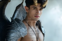 The Dragon Prince - A very attractive shirtless young male prince,standing next to him a huge dragon.