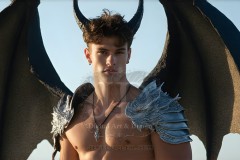 The Dragon Prince - A very attractive shirtless young male prince,standing next to him a huge dragon.