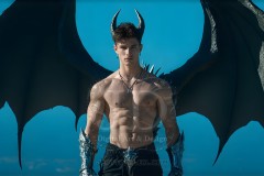 The Dragon Prince - A very attractive shirtless young male prince,standing next to him a huge dragon.