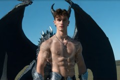 The Dragon Prince - A very attractive shirtless young male prince,standing next to him a huge dragon.