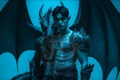 The Dragon Prince - A very attractive shirtless young male prince,standing next to him a huge dragon.
