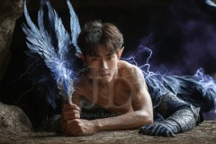 The Dragon Prince - A very attractive shirtless young male prince,standing next to him a huge dragon.
