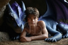 The Dragon Prince - A very attractive shirtless young male prince,standing next to him a huge dragon.